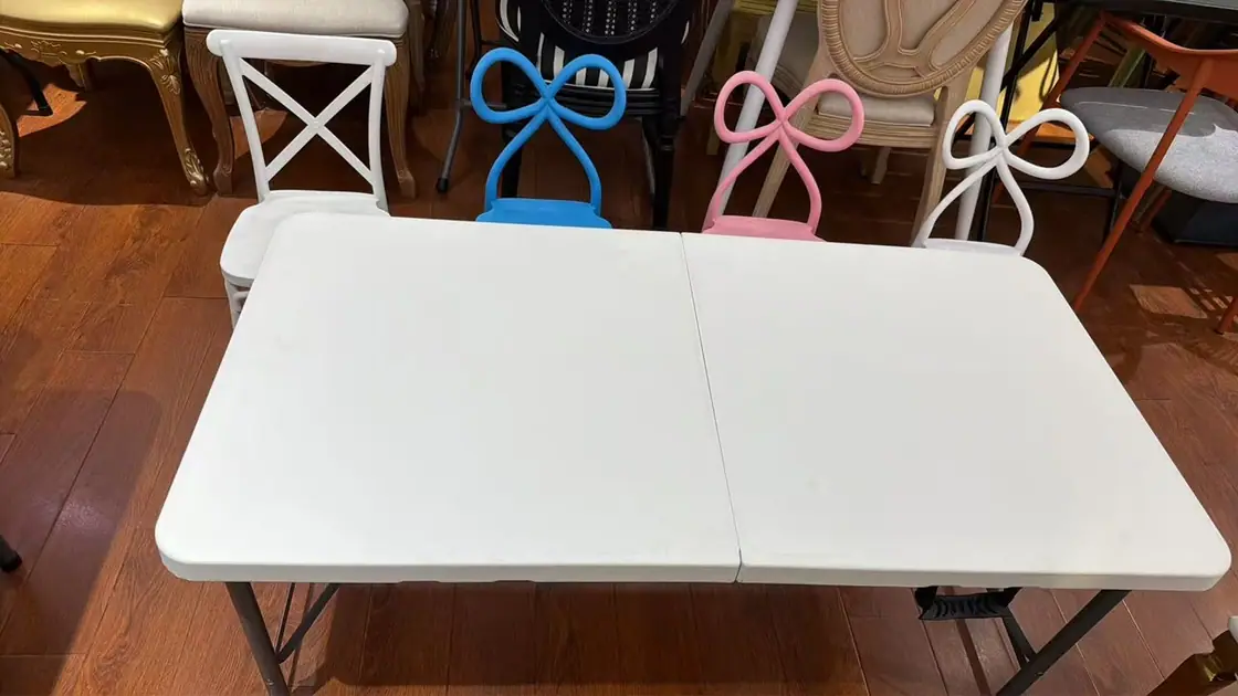 Real white event table and colourful chairs from the client